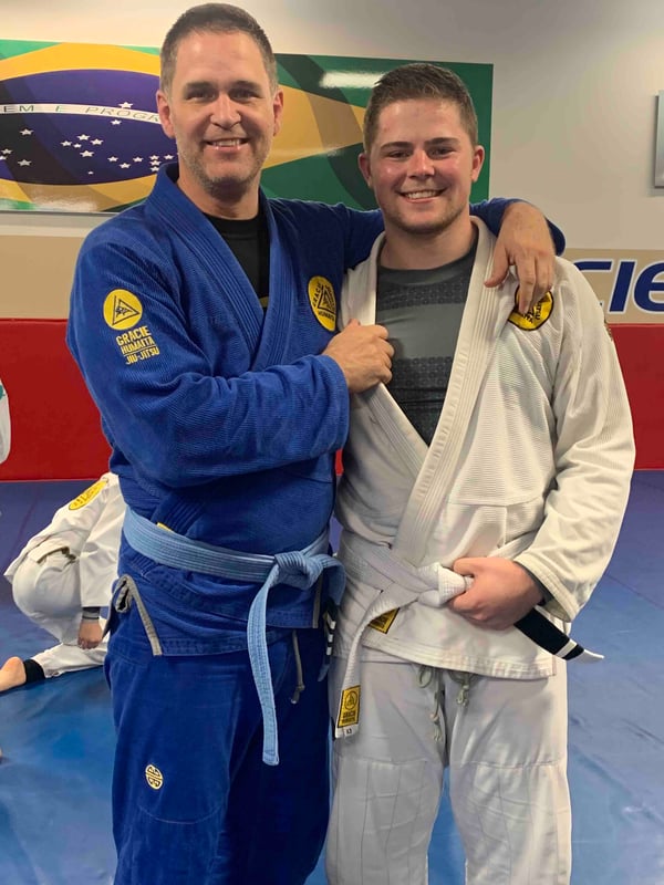 Wes and son at their Brazilian Jiu-Jitsu promotion.